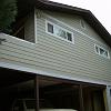 Homefront makeover with added wing at porch
